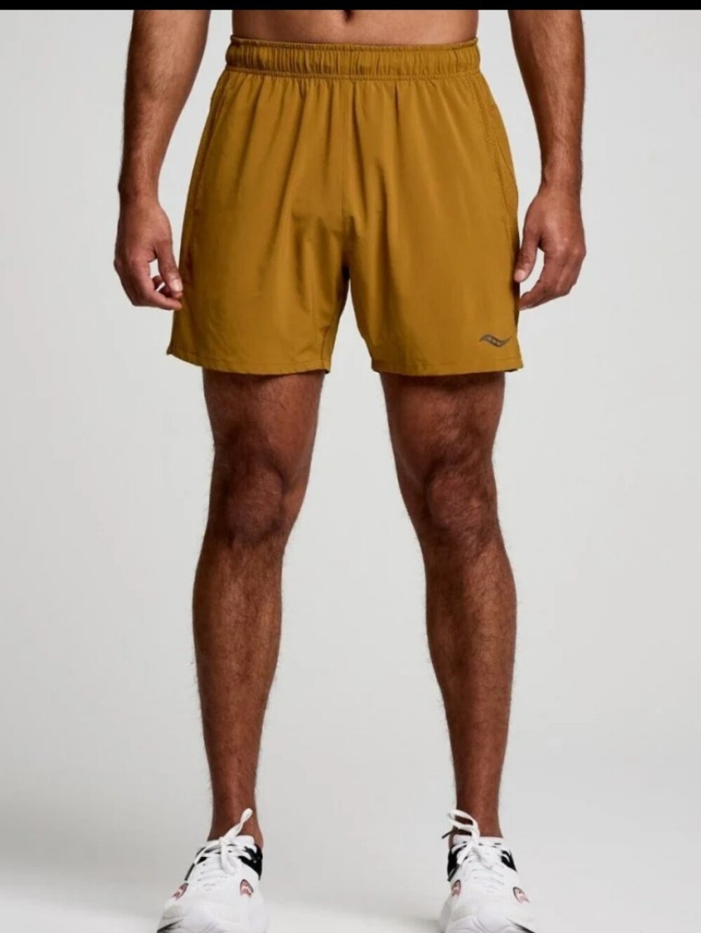 Saucony Outpace 5" running shorts In "Bronze"